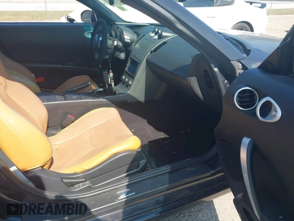 2003 Nissan 350Z Enthusiast with VIN JN1AZ34D83T107831, listed as a IAAI auction lot 41474603 with 135,137 mi miles. Bid and sale history available at carsss.com. Image 5.