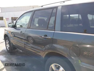 2006 Honda Pilot EX with VIN 2HKYF18416H529290, listed as a IAAI auction lot 41915915 with 135,385 mi miles and . Bid and sale history available at DreamBid. Image 14.