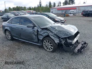 2015 Audi A4 Premium Plus z VIN WAUFFAFL5FN019698, wystawiony jako IAAI lot #42310939 z przebiegiem 72 491 mil mil oraz . Historia ofert i sprzedaży dostępna na DreamBid. Obrazek 1.