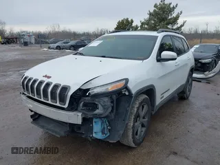 2016 Jeep Cherokee Latitude with VIN 1C4PJMCB7GW268714, listed as a IAAI auction lot 41655450 with 180,603 mi miles. Bid and sale history available at carsss.com. Image 2.