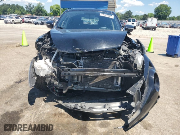 2015 Nissan Juke SV with VIN JN8AF5MV5FT558184, listed as a Copart auction lot 57761285 with 57,025 mi miles and Salvage title. Bid and sale history available at DreamBid. Image 5.