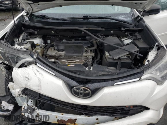 2018 Toyota RAV4 LE with VIN 2T3BFREV2JW853108, listed as a Copart auction lot 61245795 with 174,196 mi miles and Salvage title. Bid and sale history available at DreamBid. Image 12.