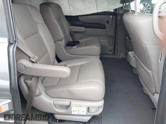 2014 Honda Odyssey Touring with VIN 5FNRL5H97EB114634, listed as a IAAI auction lot 42105220 with Not Provided miles and . Bid and sale history available at carsss.com. Image 8.