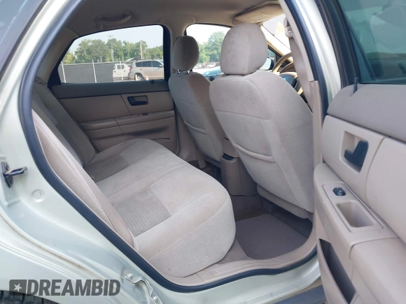 2005 Ford Taurus SE with VIN 1FAFP53205A131307, listed as a IAAI auction lot 42678385 with 198,491 mi miles and . Bid and sale history available at DreamBid. Image 8.