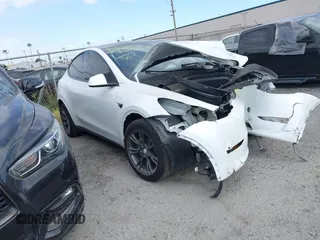 2024 Tesla Model Y with VIN 7SAYGDED2RF207783, listed as a IAAI auction lot 41758143 with Not Provided miles and . Bid and sale history available at DreamBid. Image 1.