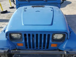 1995 Jeep Wrangler S z VIN 1J4FY19P8SP300768, wystawiony jako Copart lot #54414255 z przebiegiem 199 044 mil mil oraz Szkoda całkowita • Salvage title. Historia ofert i sprzedaży dostępna na DreamBid. Obrazek 11.