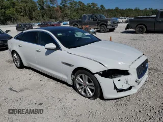 2016 Jaguar XJ Portfolio with VIN SAJWA2G79G8W00955, listed as a Copart auction lot 77650194 with 60,515 mi miles and Clean title. Bid and sale history available at DreamBid. Image 4.