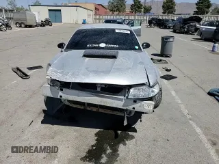 2001 Ford Mustang GT Deluxe z VIN 1FAFP42X61F165305, wystawiony jako Copart lot #53828935 z przebiegiem 175 538 mil mil oraz Szkoda całkowita • Salvage title. Historia ofert i sprzedaży dostępna na DreamBid. Obrazek 13.