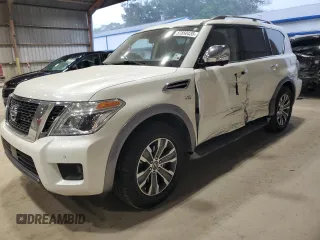 2019 Nissan Armada SL z VIN JN8AY2ND7KX008129, wystawiony jako Copart lot #57850435 z przebiegiem Nie podano mil oraz Szkoda całkowita • Salvage title. Historia ofert i sprzedaży dostępna na DreamBid. Obrazek 1.
