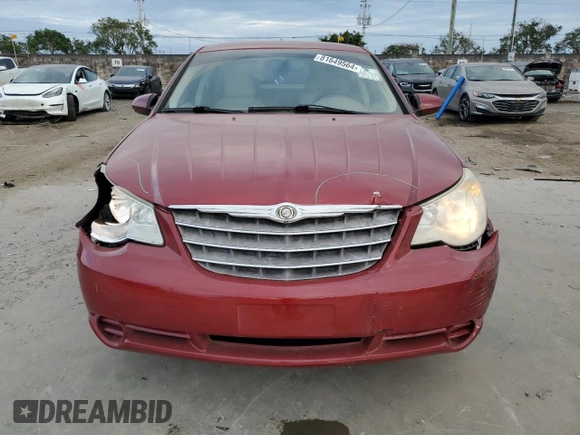 2009 Chrysler Sebring Touring *Ltd Avail* with VIN 1C3LC56B59N562555, listed as a Copart auction lot 81649564 with 133,965 mi miles and Salvage Title. Bid and sale history available at carsss.com. Image 5.