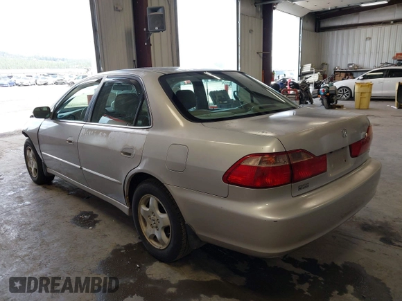 1998 Honda Accord EX z VIN 1HGCG1651WA805964, wystawiony jako IAAI lot #42320827 z przebiegiem 239 279 mil mil oraz . Historia ofert i sprzedaży dostępna na DreamBid. Obrazek 3.
