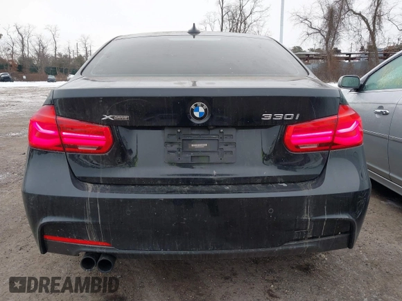 2018 BMW 3 Series 330i xDrive with VIN WBA8D9C59JA012658, listed as a IAAI auction lot 41523677 with 117,049 mi miles and . Bid and sale history available at DreamBid. Image 16.