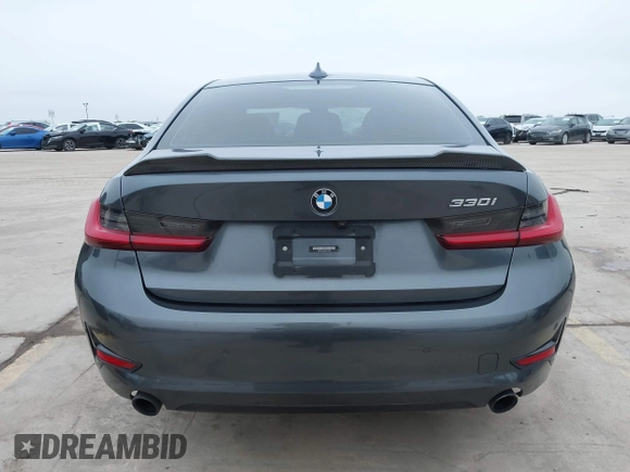 2021 BMW 3 Series 330i with VIN 3MW5R1J09M8C15403, listed as a IAAI auction lot 41892341 with 30,975 mi miles and . Bid and sale history available at carsss.com. Image 16.