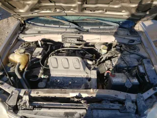 2002 Mazda Tribute LX with VIN 4F2CU08172KM40111, listed as a Copart auction lot 47141754 with 131,324 mi miles and Non Repairable. Bid and sale history available at carsss.com. Image 12.