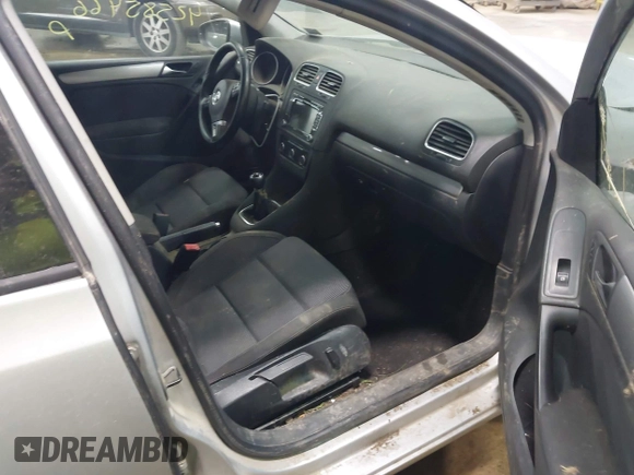 2012 Volkswagen Golf TDI with VIN WVWNM7AJ8CW333137, listed as a IAAI auction lot 42585466 with 213,587 mi miles and . Bid and sale history available at DreamBid. Image 5.