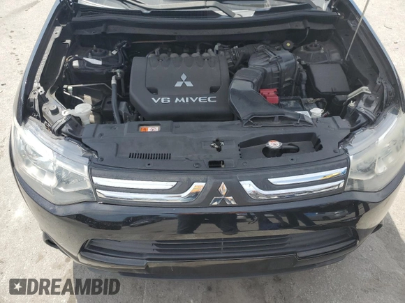 2014 Mitsubishi Outlander GT z VIN JA4JZ4AX7EZ017369, wystawiony jako Copart lot #54223775 z przebiegiem 131 555 mil mil oraz Szkoda całkowita • Salvage title. Historia ofert i sprzedaży dostępna na DreamBid. Obrazek 12.