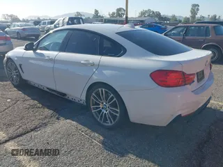 2016 BMW 4 Series 428i with VIN WBA4A9C56GGL88280, listed as a IAAI auction lot 41934868 with 166,720 mi miles and . Bid and sale history available at carsss.com. Image 3.