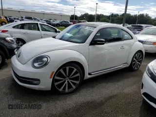 2012 Volkswagen Beetle 2.0T Turbo with VIN 3VWV67ATXCM645274, listed as a Copart auction lot 74268104 with 54,142 mi miles and Salvage Title. Bid and sale history available at carsss.com. Image 1.