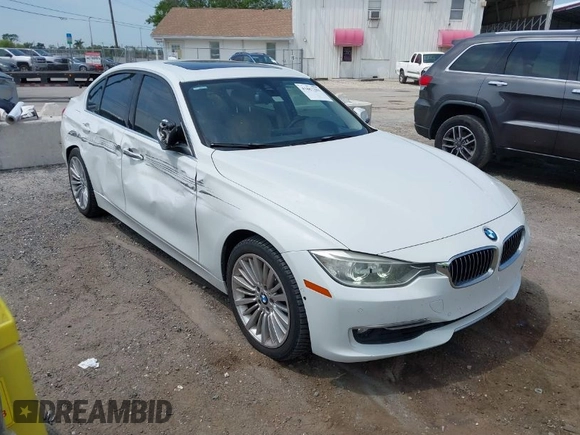 2012 BMW 3 Series 328i with VIN WBA3A5C51CF348290, listed as a IAAI auction lot 41867281 with 100,757 mi miles. Bid and sale history available at carsss.com. Image 1.