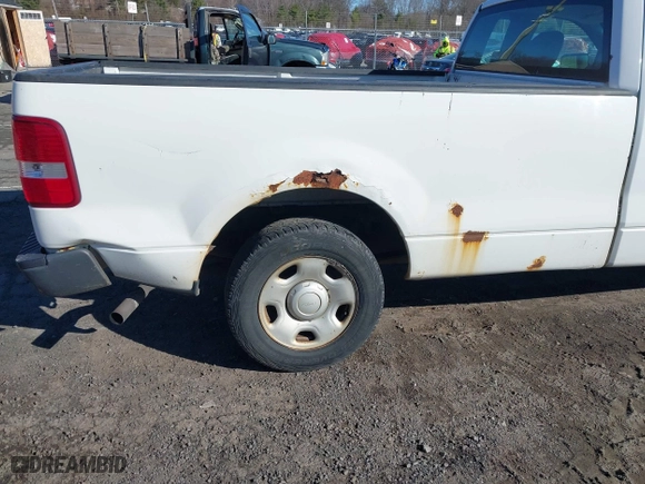 2005 Ford F-150 XL with VIN 1FTRF12285NB41452, listed as a IAAI auction lot 41903892 with 290,233 mi miles. Bid and sale history available at carsss.com. Image 14.