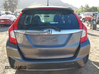 2015 Honda Fit EX-L with VIN 3HGGK5H88FM772964, listed as a IAAI auction lot 42020142 with 154,799 mi miles. Bid and sale history available at carsss.com. Image 16.