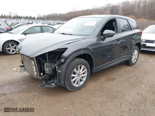 2016 Mazda CX-5 Touring with VIN JM3KE4CY7G0715507, listed as a IAAI auction lot 41699610 with 108,206 mi miles. Bid and sale history available at carsss.com. Image 2.