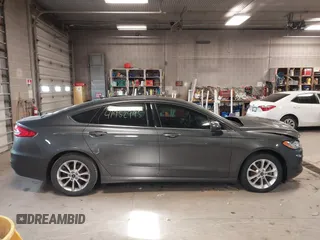 2020 Ford Fusion SE z VIN 3FA6P0LU4LR118809, wystawiony jako IAAI lot #41952995 z przebiegiem 35 353 mil mil oraz . Historia ofert i sprzedaży dostępna na DreamBid. Obrazek 14.