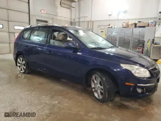 2011 Hyundai Elantra Touring SE with VIN KMHDC8AE0BU092798, listed as a Copart auction lot 84217814 with 182,987 mi miles and Salvage Title. Bid and sale history available at carsss.com. Image 4.