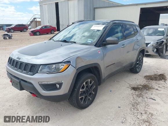 2020 Jeep Compass Trailhawk z VIN 3C4NJDDB5LT171727, wystawiony jako IAAI lot #41844523 z przebiegiem 103 952 mil mil oraz . Historia ofert i sprzedaży dostępna na DreamBid. Obrazek 18.