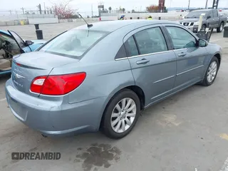 2010 Chrysler Sebring Limited with VIN 1C3CC5FD4AN155803, listed as a IAAI auction lot 42172797 with 107,408 mi miles. Bid and sale history available at carsss.com. Image 4.