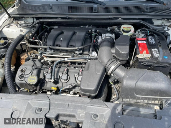2015 Ford Taurus Limited with VIN 1FAHP2F80FG176642, listed as a Copart auction lot 64948025 with 159,916 mi miles and Clean title. Bid and sale history available at DreamBid. Image 12.