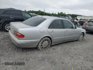 2000 Mercedes-Benz E 320 with VIN WDBJF65J1YB099417, listed as a Copart auction lot 54656915 with 130,387 mi miles and Salvage Title. Bid and sale history available at DreamBid. Image 3.