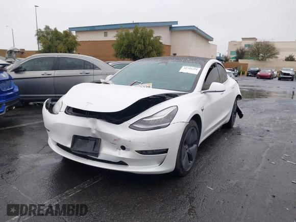 2020 Tesla Model 3 Standard Range Plus with VIN 5YJ3E1EA2LF740225, listed as a IAAI auction lot 41781554 with 46,703 mi miles. Bid and sale history available at carsss.com. Image 22.