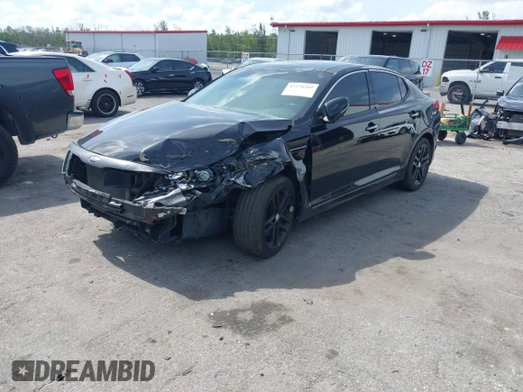2013 Kia Optima SX with VIN 5XXGR4A61DG100479, listed as a IAAI auction lot 42376261 with 201,615 mi miles and . Bid and sale history available at DreamBid. Image 2.