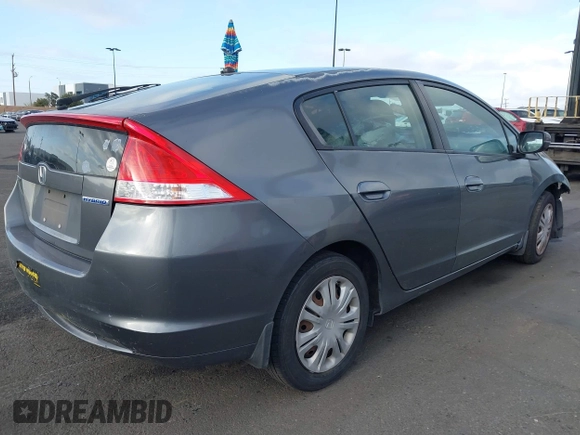 2010 Honda Insight LX with VIN JHMZE2H5XAS038974, listed as a IAAI auction lot 41958346 with Not provided miles and . Bid and sale history available at DreamBid. Image 4.