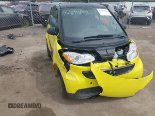 2013 Smart fortwo Pure with VIN WMEEJ3BA5DK663165, listed as a IAAI auction lot 42291804 with 105,074 mi miles and . Bid and sale history available at DreamBid. Image 6.