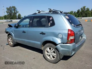 2009 Hyundai Tucson GLS with VIN KM8JM12B29U953176, listed as a Copart auction lot 70141174 with 77,132 mi miles and Salvage Title. Bid and sale history available at carsss.com. Image 2.