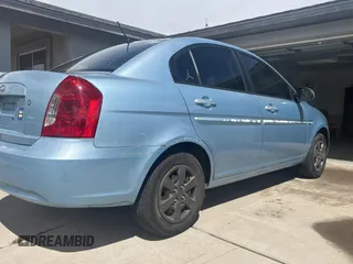 2008 Hyundai Accent GLS with VIN KMHCN46C68U190250, listed as a Copart auction lot 52031835 with 238,026 mi miles and Salvage Title. Bid and sale history available at carsss.com. Image 4.