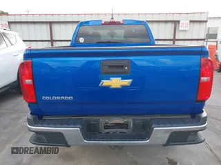 2018 Chevrolet Colorado 2WD Work Truck z VIN 1GCHSBEA8J1300911, wystawiony jako IAAI lot #42543557 z przebiegiem 73 896 mil mil oraz . Historia ofert i sprzedaży dostępna na DreamBid. Obrazek 16.