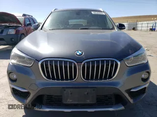 2017 BMW X1 xDrive28i with VIN WBXHT3C35H5F76415, listed as a Copart auction lot 48533495 with 66,448 mi miles and Salvage Title. Bid and sale history available at carsss.com. Image 5.