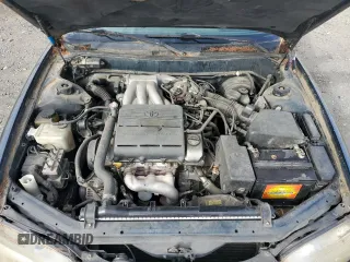 1995 Toyota Camry LE z VIN 4T1GK12W4SU079938, wystawiony jako Copart lot #77065084 z przebiegiem 222 731 mil mil oraz Szkoda całkowita • Salvage title. Historia ofert i sprzedaży dostępna na DreamBid. Obrazek 11.