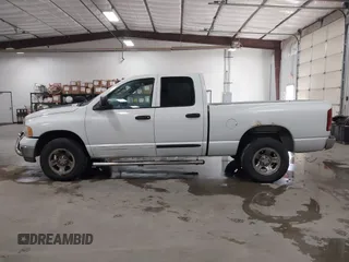 2002 Dodge 1500 with VIN 3D7HA18N42G206559, listed as a IAAI auction lot 41405308 with 242,865 mi miles and . Bid and sale history available at DreamBid. Image 14.