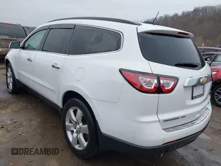 2017 Chevrolet Traverse Premier with VIN 1GNKVJKD5HJ324803, listed as a IAAI auction lot 41464714 with 98,753 mi miles and . Bid and sale history available at DreamBid. Image 3.