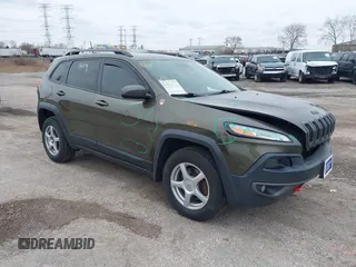 2016 Jeep Cherokee Trailhawk z VIN 1C4PJMBS0GW148738, wystawiony jako IAAI lot #41963119 z przebiegiem 117 636 mil mil oraz . Historia ofert i sprzedaży dostępna na DreamBid. Obrazek 1.