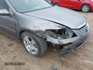 2006 Acura RL z VIN JH4KB16526C006190, wystawiony jako IAAI lot #42351400 z przebiegiem 150 749 mil mil oraz . Historia ofert i sprzedaży dostępna na DreamBid. Obrazek 6.