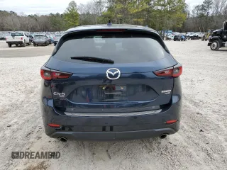 2022 Mazda CX-5 2.5 Turbo with VIN JM3KFBAY3N0603921, listed as a Copart auction lot 43679495 with 27,073 mi miles and Salvage Title. Bid and sale history available at carsss.com. Image 6.