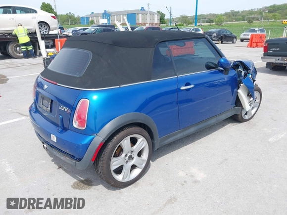 2006 MINI Convertible S with VIN WMWRH335X6TK59110, listed as a IAAI auction lot 42089085 with 101,303 mi miles and . Bid and sale history available at DreamBid. Image 4.