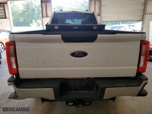 2023 Ford Super Duty F-250 SRW XL with VIN 1FT7W2BT3PEC12596, listed as a Copart auction lot 65771294 with 28,552 mi miles and Salvage Title. Bid and sale history available at carsss.com. Image 6.