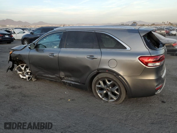 2016 Kia Sorento SXL with VIN 5XYPK4A12GG032749, listed as a Copart auction lot 85114774 with 111,220 mi miles and Salvage Title. Bid and sale history available at carsss.com. Image 2.