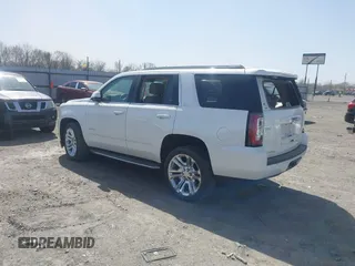 2017 GMC Yukon SLT with VIN 1GKS1BKC9HR278190, listed as a IAAI auction lot 41824213 with 104,323 mi miles. Bid and sale history available at carsss.com. Image 3.